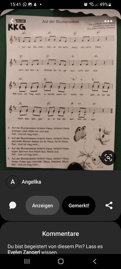 an iphone screen with music notes on it and the words in german are below them