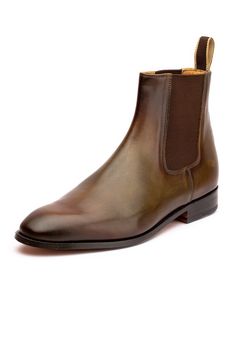 Olive, brown leather chelsea boots with hand built Argentinean leather sole, French raw white crust leather painted with patina finish and rich tan cow leather lining.

Composition:Full Grain Calf Leather Uppers
Color:Brown
Heel Height (inch): 1
Weight (kgs): 1 - Aza Fashions Brown Chelsea Boots With Leather Sole And Cap Toe, Brown Goodyear Welted Chelsea Boots With Plain Toe, Brown Chelsea Boots With Cap Toe And Leather Sole, Brown Oiled Leather Chelsea Boots With Leather Sole, Brown Oiled Leather Chelsea Ankle Boots, Brown Oiled Leather Chelsea Boots, Oiled Leather Chelsea Ankle Boots With Leather Lining, Chelsea Boots For Men, Brown Leather Chelsea Boots