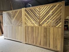 a large wooden gate in the middle of a building