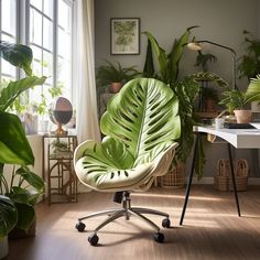 a green chair sitting on top of a hard wood floor next to a table and potted plants