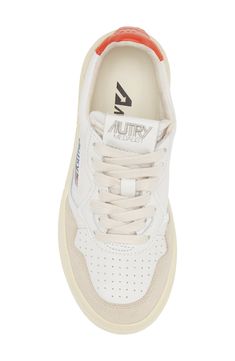 A vintage-inspired design elevates a sporty leather sneaker with smart perforations for breathable comfort. Lace-up style Removable insole Leather upper/textile and leather lining/rubber sole Imported High-top Cream Sneakers With Perforations, Sporty Custom Cream Sneakers With Perforated Toe Box, Sporty Cream Sneakers With Perforations, Classic Cream Sneakers With Perforations, Cream Leather Sneakers With Boost Midsole, Sporty Cream Sneakers With Perforated Toe Box, Cream Leather Sneakers For Light Sports, Cream Sneakers With Perforated Toe Box For Sports, Leather Sneakers With Laces For Light Sports