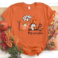 Personalized love granny life flower gnome cute Autumn T-ShirtIf you looking for a personalized t-shirt to show your love to your family, it's will be best choice. Our Classic T-Shirt serves as the perfect short-sleeved shirt for your unique, funny, or personalized designs. Features such as a lay flat collar and a classic?ÿunisex cut will make this your new favorite t-shirt. Brand: Gildan Heavy weight fabric Classic unisex?ÿmakes this an easy fit Size up if you want something roomier Our shirts Flower Gnome, Life Flower, Cute Autumn, Autumn T Shirts, Flat Collar, Dark Grey Color, Personalized Clothes, House Flags, Flower Of Life