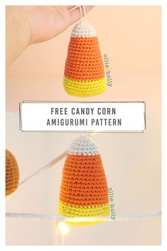 a crocheted candy corn ornament hanging from a string with the text free candy corn amigurum pattern