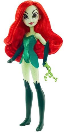 the little mermaid doll is wearing green and red hair, holding a flower in her hand