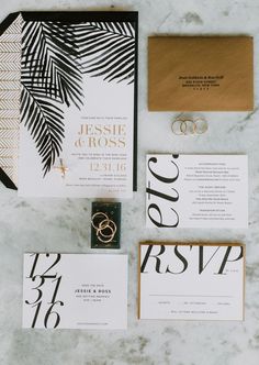 the wedding stationery was done in black and gold