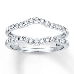 two white gold wedding bands with diamonds