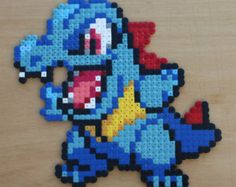 a piece of art made out of perler beads