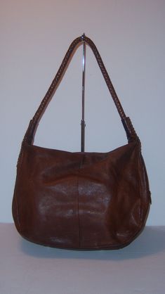 "Vintage Harold's brown round bubble leather braided woven handle handbag, purse or bag. Good pre-owned condition. No holes, stains, rips, tears, etc. Some scratching on bottom backside. Measurements: 15\" X 11\" X 4\". Braided or woven leather strap. Made in Italy. Great style!" Brown Leather Handheld Hobo Bag, Brown Woven Leather Hobo Bag For Shopping, Brown Hobo Bag With Braided Handles For Travel, Brown Hobo Bag With Braided Handles For Daily Use, Brown Handheld Hobo Bag With Braided Handles, Brown Hobo Bag With Braided Handles For Shopping, Brown Hobo Shoulder Bag With Braided Handles, Brown Hobo Bag With Handles, Cheetah Animal