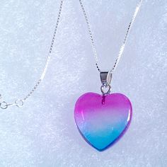 Adorable Sterling Silver Heart And Quartz Necklace. Necklace Is 16” And Made Of Sterling Silver. Heart Is Blue And Pink Quartz. Pendant Is 1” Long. Comes With Gift Box. Cute Blue Necklace For Gift, Rainbow Necklace With Heart Charm As Gift, Purple Heart-shaped Necklace For Valentine's Day, Purple Heart Cut Necklace For Valentine's Day, Purple Heart Necklace For Valentine's Day, Purple Heart Pendant Necklace For Jewelry Making, Rainbow Heart Pendant Necklace For Gift, Rainbow Heart Necklaces As Gifts, Heart-shaped Rainbow Necklace For Gift