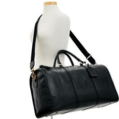 B1043V_SCBLSCBL2018_ALT4 Classic Travel Bag With Leather Backing For Daily Use, Classic Leather Duffle Bag For Everyday Use, Classic Everyday Duffle Bag With Leather Backing, Black Duffle Bag With Leather Lining For Daily Use, Luxury Leather-backed Duffle Bag For On-the-go, Luxury Leather Duffle Bag For On-the-go, Functional Smooth Grain Travel Bag, Classic Black Weekender Bag With Leather Backing, Black Duffle Bag With Leather Lining For Everyday Use