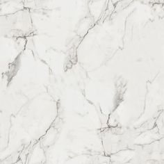 a white marble textured surface with grey veiners