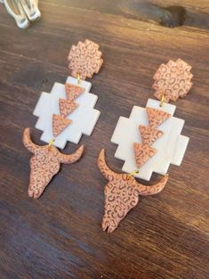 #103 HANDMADE CLAY EARRINGS - bullhead, cow, cowgirl, earrings, handmade, leopard, lightweight, lightwright, longhorn, skull -  - Baha Ranch Western Wear Clay Cross Earrings, Clay Polymer Earrings, Clay Cross