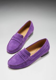 Hugs & Co. purple penny loafers for women. Moccasin style loafers in a soft purple leather outer and lined with light tan leather for extra comfort. The light weight leather sole achieves a low profile silhouette for this style. Italian Suede Upper Leather sole Natural Tan Leather Lining Traditional Hand Stitching Lightly Padded Insole Made in Portugal Womens Penny Loafers, Penny Loafer, Moccasins Style, Purple Suede, Leather Moccasins, Soft Purple, Purple Leather, Natural Tan, Penny Loafers