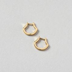 14k yellow gold | Each earring measures approximately 13mm wide and 12mm tall | Hinged snap back closure Classic Tarnish-resistant Huggie Cartilage Earrings, Classic 14k Gold-filled Yellow Gold Cartilage Earrings, 14k Yellow Gold Clip-on Huggie Earrings, Classic Gold Huggie Cartilage Earrings, Classic Yellow Gold Cartilage Earrings, Classic 14k Yellow Gold Cartilage Earrings, Classic Small Hoop Cartilage Earrings, Classic Gold-plated Yellow Gold Cartilage Earrings, Classic 14k Gold Filled Huggie Cartilage Earrings