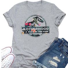 Motherhood Is A Walk In The Park Funny Dinosaur Printed Women T Shirts Mom Life Graphic Tshirt Causal Tumblr T-shirt Green Shirt Tumblr T Shirt, Funny Dinosaur, Stretch Mesh Fabric, Dinosaur Funny, Cover Beachwear, Purple Mini Dresses, Walk In The Park, Clubwear Dresses, Backless Mini Dress