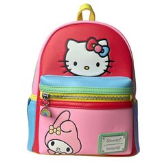 Sanrio (By Loungefly) - You Are Sure To Love Carrying Your Essentials In This Adorable And Vibrantly Designed Hello Kitty And Friends Backpack. Great Gift Idea For A Sanrio Fan. Brand New, Never Used. Details: -L: 9” X W: 5” X H: 10.5” -Vegan Leather -Debossed Sanrio Characters -Zippered Main Compartment -2 Open Side Pockets -1 Outer Zippered Pouch -1 Inner Open Pocket -Rainbow Charm -Silver-Toned Hardware -Enamel Sanrio/Loungefly Badge Kawaii Multicolor Bag With Zipper Closure, Multicolor Kawaii Bag With Zipper Closure, Hello Kitty Multicolor Travel Backpack, Multicolor Hello Kitty Travel Backpack, Sanrio Loungefly, Friends Backpack, Cute Mini Backpacks, Hello Kitty And Friends, Mini Backpacks