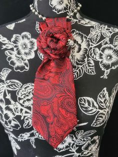 This  Red Paisley Necktie Necklace is made with a woven silk tie, and features a Silver Rhinestone Bumble Bee Brooch strung on your choice of an adjustable Rosary Chain Ribbon Tie Pearl Necklace or an adjustable Elastic Band. The soft, comfortable fabric sits perfectly on any size chest, while the adjustable necklace feature allows you to customize the fit to your liking. Measuring at a versatile length, this necktie necklace is designed to be a one-size-fits-all. View all Women Tie's: https://www.etsy.com/shop/FearlessAccessorizer?ref=seller-platform-mcnav§ion_id=49097355 The single strand of pearls is an easy and fashionable way to wear this tie necklace. Looks really cute on a t-shirt or a blouse. All jewelry is individually handmade solely by me the designer and owner of Fearless & Fai Elegant Red Neckwear For Gift, Elegant Red Neckwear As A Gift, Elegant Adjustable Red Neckwear, Elegant Semi-formal Neckwear With Paisley Print, Red Formal Neckwear Standard Tie, Women Necktie, Necktie Crafts, Women Ties, Tie Necklace