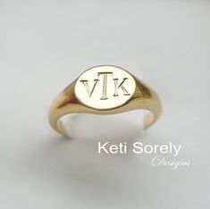 "Personalized dainty signet ring with monogram initials in precious metal s of your choice. Hand engraved round disc ring with your initials etched into the metal. Ring can be crafted in Sterling Silver, 10K Gold, 14K gold or 18K Gold. Order any initials and they will be hand engraved by our talented jewelers. Design by Keti Sorely. Metal options: - Sterling Silver - Sterling Silver 0.925 with Yellow Gold overlay - 10K Gold (Yellow, Rose or White) - 14K Gold (Yellow, Rose or White) - 18K Gold (Y Gold Oval Initial Ring Stamped 14k, 14k Gold Engraved Ring With Initials, 14k Gold Oval Monogram Jewelry, Gold Signet Ring With Engraving For Anniversary, Oval 14k Gold Monogram Jewelry, Oval Monogram 14k Gold Jewelry, Gold Engraved Initials Ring In 14k, 14k Yellow Gold Signet Ring With Initials, Gold Sterling Silver Engraved Initial Ring