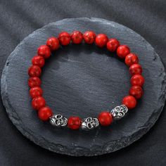 Find yourself and become more aware of the true you, let wealth and richness of the mind be your ally. This powerful red Tibetan Skull Bracelet will enhance your emotions! Welcome ladies and gentlemen, do you like vampires and their universe? If so then you probably like the color red right? the color that represents blood and war and efforts, if it’s the case then you might want to snag this pretty piece right here named the Tibetan skull bracelet it has a beautiful color configuration that fit Red Bracelets With 8mm Beads For Meditation, Red Beaded Bracelets For Meditation 8mm, Red Meditation Bracelets With 8mm Beads, Skull Shaped 8mm Bead Jewelry Gift, Tibetan Skull, Skull Lover, Skull Bracelet, Simple Tshirt, Beaded Skull