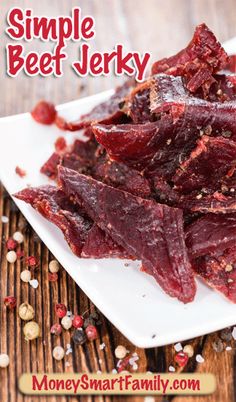 simple beef jelks on a white plate with pepper sprinkles around it