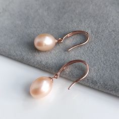 Freshwater Pearl Earrings. Rose Gold Earrings, Pearl Minimalist Drop earrings, evening earrings for special occasions. Pearl drop earrings.  💎 Gem Stone: AAA Freshwater Pearls, 💎 Material: Sterling Silver with rose gold plating (vermeil).  💎Length including Pearl: 26mm approximately (Pearl length will vary)  💎Size of Pearls: Natural Pearl size is depending on the pearl stock I have each time, which I would do my best to match them for you. Or leave me a note during checkout for your preferen Rose Gold Teardrop Pearl Earrings With Ear Wire, Rose Gold Teardrop Pearl Earrings For Party, Formal Rose Gold Earrings With Ear Wire, Evening Earrings, Pearl Jewelry Gift, Freshwater Pearl Drop Earrings, Freshwater Pearl Jewelry, Pearl Jewellery, Natural High