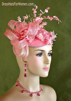 Women's Pink Coral Sinamay Straw Flower Large Sinamay Bow Fashion Designer Haute Couture Hat Headpiece Wedding Fascinator Hair Accessory. A Large Pink Sinamay Straw Bow Is Placed On A Simulated Pink Sinamay Straw Round Base, Accented With Custom Dyed Silk Flowers. A Row Of Acrylic Rhinestone Encircles The Base Of This Beautiful Headpiece. This Formal Art Deco Styled 1920's Style Flapper Hat Wedding Headpiece Can Be Worn In Different Positions. This ladies bespoke couture formal designer wedding Pink Sinamay Fascinator For Formal Occasions, Elegant Pink Fascinator For Event, Elegant Pink Fascinator For Events, Pink Headpieces For Royal Ascot Event, Pink Flower Headpiece For Wedding, Pink Flower Headpieces For Wedding, Elegant Pink Sinamay Mini Hat, Elegant Pink Mini Hat For Events, Pink Feminine Fascinator For Kentucky Derby