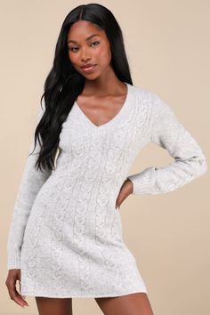 Grab your cutest booties and layer up your look with the Lulus Snuggly Chic Grey Cable Knit Long Sleeve Sweater Mini Dress! Soft and stretchy cable knit (with a heathered effect throughout) shapes this effortless sweater dress that has long sleeves and a bodice with a V-neckline. Fit-and-flare silhouette hugs the waist and falls to a mini hem. Ribbed knit accents the neckline and cuffs. Fit: This garment fits true to size. Length: Mid-thigh. Size medium measures 31.75" from shoulder to hem. Bust Sweater Mini Dress, Mini Dress Long Sleeve, Mini Sweater Dress, Knit Long Sleeve, Knit Mini Dress, Knit Sweater Dress, Large Size Dresses, Sleeve Sweater, Long Sleeve Sweater