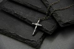 A Sterling silver cross pendant in rustic and minimalist style is a perfect gift for a christening or baptism. Or just a treat for yourself. Because if its simple and discreet design it fits anyone, and it will look good with any style.  It will be a lovely gift for anyone religious.    Pendant width: 1.7 Centimetres; Pendant height: 2.8 Due to the process of making this pendant, the actual pendant will vary slightly from the listing photo. Please let us know if You have any specific requests wh Minimalist Handmade Cross Jewelry, Rustic Cross Jewelry For Gifts, Rustic Cross Jewelry Gift, Gift Cross Necklace With Oxidized Finish, Oxidized Cross Necklace As Gift, Oxidized Finish Cross Necklace For Gifts, Oxidized Finish Cross Necklace As Gift, Riveted Ring, Simple Cross