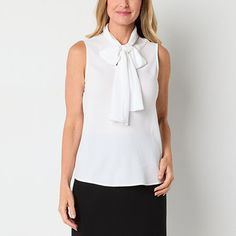 This Black Label by Evan-Picone women's sleeveless blouse offers a sophisticated and stylish look thanks to its chic bow-tie neckline. It's crafted from crepe for a regular-fit. Style it with tailored pants and heels for a polished, professional look.Closure Type: Pullover HeadFit: Regular FitNeckline: Split Tie NeckSleeve Length: SleevelessApparel Length: 23.5 InchesFiber Content: 100% PolyesterFabric Description: CrepeCare: Machine Wash, Line DryMaterial: PolyesterCountry of Origin: Imported Classic Sleeveless Blouse For Office, Classic White Sleeveless Blouse, Fitted Sleeveless Blouse For Office, Classic Sleeveless Office Tops, White Tie Neck Tops For Workwear, Casual Sleeveless Top For Office, Sleeveless Office Vest Top, Classic Sleeveless Tops For Work, White Sleeveless Office Blouse