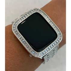 Fits Apple Watch in sizes 38mm 40mm 41mm 42mm 44mm 45mm Series 1-6 SE. This is a custom Iwatch Candy Apple Watch Band in Silver set with Swarovski Crystal in a luxury Alloy Metal. The sparkle on this band is amazing. Can be adjusted to fit wrist sizes from 5.5" to 8". Easy to resize and comes with a tool/instructions. You can select the set band+bezel, band only or bezel cover only using the drop down menus. Bezel Cover Add a Silver custom 14k white gold plated Metal Case Cover Bezel with hand s Luxury Silver Watch Bands With Bling, Luxury Silver Apple Watch Band, Bezel Band, Ceramic Watch, Rose Gold Band, Candy Apple, White Gold Band, Candy Apples, Bezel Diamond