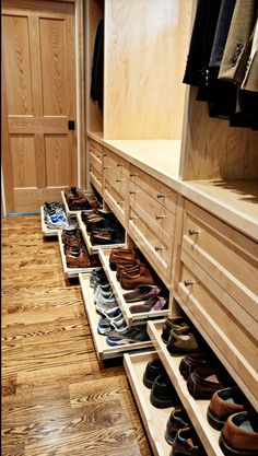 there are many pairs of shoes in the closet