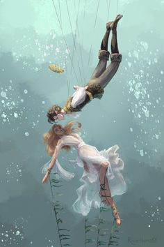 two people are floating in the water while holding onto strings with their hands and feet