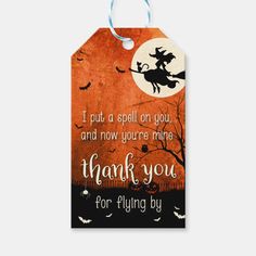 an orange and black halloween gift tag with the words, i put a spell on you and now you're riding thank you for flying by