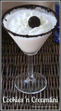 a drink with ice cream and an oreo in it