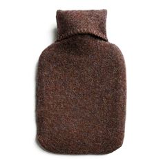 Tweedmill's hot water bottle comes with a recycled wool cover that is woven with repurposed wool in their factory in Flint, UK. The cover provides a soft, comfortable exterior for the included hot water bottle. The clever neck design completely covers the mouth of the bottle, while still allowing it to be removed. * Please note that you will receive both a water bottle and a removable cover. Materials: cover is 50% wool & 50% recycled wool; hot water bottle is made of rubber Made by: Tweedmill M Woollen Blankets, Water Bottle Covers, Hot Water Bottle Cover, Moving Boxes, Diy Cosmetics, Hot Water Bottle, Wedding Anniversary Cards, Bottle Cover, Diagonal Stripes