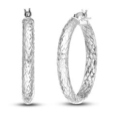 Dynamic 30mm hollow round tubes are embellished with distinctive diamond-cut patterns on the inside and outside in these striking women's hoop earrings. Fashioned in 14K white gold, the earrings secure in place with hinged backs. Silver Round Diamond Cut Hoop Earrings, Modern Round Diamond Cut Hoop Earrings, Jared The Galleria Of Jewelry, Inside And Outside, Diamond Cut, Fashion Earrings, Diamond Jewelry, Diamond Cuts, Hoop Earrings