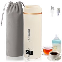 thermos and cups are sitting next to each other on a white surface with a drawstring bag