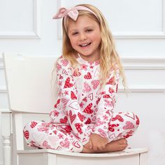 Why settle for ordinary PJs when you can make *bedtime* into something *extra-special*? Hearts Girl's Pajama Set is designed with your little one in mind—super soft, stretchy bamboo/cotton/spandex fabric that's hypoallergenic, eco-friendly and sweat-resistant. Plus, the fun, hand-drawn heart pattern will keep her snuggled up in style! Valentine Pajamas, Drawn Heart, Bamboo Pajamas, Hearts Girl, Unique Baby Gifts, Design Textile, Top And Pants Set, Girls Valentines, Sleep Set