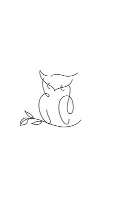 an owl sitting on the ground with its eyes closed