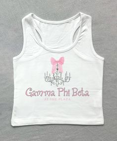 gamma phi at the plaza <3 ♡ NEED A BULK ORDER? We offer bulk discounts for orders over 35 shirts. Please check the last listing photo for exact pricing! We also offer this print on: SWEATSHIRTS, TEES (COMFORT COLORS OR GILDAN), AND BABY TEES. ♡ Please read full description and try not to order too close to your event! I will make sure your shirt is out by my scheduled date, but delays sometimes do happen through USPS, so please allot enough time for delivery. ♡ NO REFUNDS are accepted on sorority shirts, but please contact me if you have an error with your order. ♡ This listing comes in a cropped tank. Please check size chart for sizing info! If you would like this design on a baby tee for a bulk order, please reach out so I can accommodate that request! ♡ Please check size chart for exact Sorority Merch T-shirts & Tank Tops, Fancy Hotel, Sigma Delta Tau, Bid Day Shirts, Big Little Shirts, Sorority Shirt, Pi Phi, Gamma Phi Beta, Zeta Tau Alpha