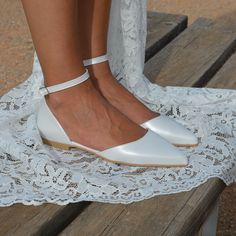 "❤The shoes of your dreams will be handmade for you, by our skilled artisans, using the finest materials and exquisite craftsmanship❤ ''NO PLAIN JANE''.   A pair of elegant and comfortable ballet flats, made by the finest pearly leather. All of the embellishments are handsewn onto the sandals. Choose White or Ivory color.  ❤Handmade to order in WHITE or IVORY leather color.  ❤Heel Height: 1cm /0.39\" ❤Run true to size/Medium Width. NOT suitable for Wider width. ❤Premium Genuine Greek leather ❤An Bridal Shoes Flat, Flat Wedding Shoes, Comfortable Ballet Flats, Pointy Pumps, Strap Flats, Wedding Pumps, Bridal Shoes Flats, Plain Jane, Wedding Shoes Flats