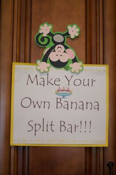 a sign that says make your own banana split bar