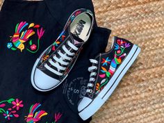 Embroidered tennis shoes Made in Mexico Available in whole sizes only Go up 1/2 size Available with different embroidery designs Matching tee is available in our clothing section Handmade Multicolor Low-top Sneakers, Multicolor Embroidered Low-top Sneakers, Multicolor Embroidered Logo Low-top Sneakers, Low-top Sneakers With Multicolor Floral Embroidery, Mexican Theme Quinceanera Dresses, Mexican Style Outfits, Mexican Theme Dresses, Quinceanera Shoes, Mexican Shoes