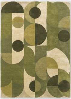 a green rug with circles and shapes on it