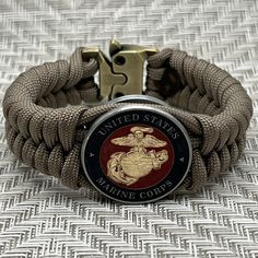 a bracelet with a us marine emblem on it