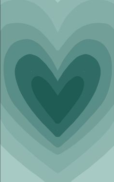 a green heart shaped object in the middle of a blue and gray background with an overlay effect