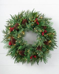 Deck the halls with charming lifelike greenery to create a natural, cozy look. Hang on doorways or above the mantel for a timeless touch to your holiday home. | Outdoor Winter Evergreen Wreath Christmas Wreaths With Lights, Pre Lit Wreath, Christmas Wreaths & Garlands, Artificial Christmas Wreaths, Evergreen Wreath, Outdoor Wreaths, Wreaths And Garlands, Christmas Ornament Sets, Artificial Christmas Tree