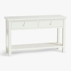 a white console table with two drawers