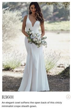 a woman in a white dress holding a bouquet