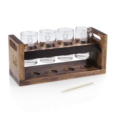 a wooden holder with six glasses on it